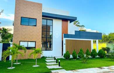 Imagem: A casa possui 4 Dormitórios, 4 Suítes, 4 Banheiros, 3 Vagas