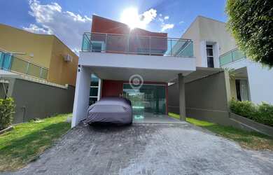 Imagem: A casa possui 4 Dormitórios, 3 Suítes, 5 Banheiros, 2 Vagas