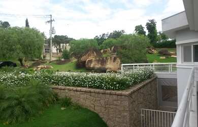 Imagem: A casa em condomínio possui 6 Dormitórios, 4 Suítes, 11 Banheiros