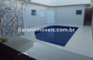 Imagem: A casa possui 2 Dormitórios, 2 Suítes, 3 Banheiros, 2 Vagas