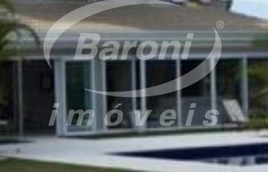 Imagem: A casa em condomínio possui 6 Dormitórios, 6 Suítes, 9 Banheiros