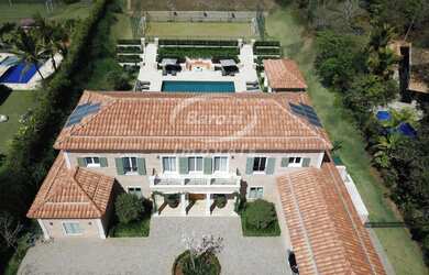 Imagem: A casa em condomínio possui 7 Dormitórios, 6 Suítes, 7 Banheiros