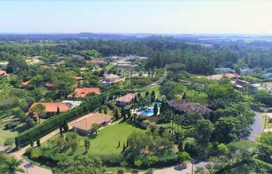 Imagem: A casa em condomínio possui 5 Dormitórios, 5 Suítes, 11 Banheiros