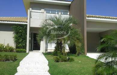 Imagem: A casa em condomínio possui 3 Dormitórios, 3 Suítes, 5 Banheiros