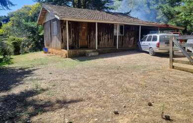 Imagem: A chácara possui 3 Dormitórios, 1 Banheiro, 6.000m² de Área