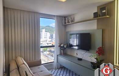 Imagem: O apartamento possui 2 Dormitórios, 1 Suíte, 2 Banheiros