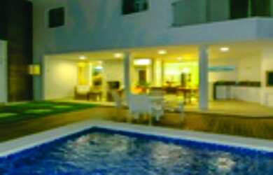 Imagem: A casa possui 4 Dormitórios, 3 Suítes, 200m² de Área Privada