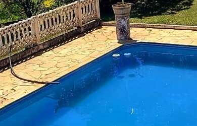 Imagem: A chácara possui 4 Dormitórios, 1 Suíte, 4 Banheiros, 18