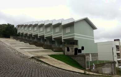 Imagem: A casa possui 2 Dormitórios, 1 Banheiro, 1 Vaga na garagem