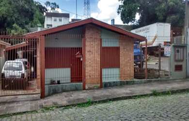 Imagem: A casa possui 2 Dormitórios, 1 Banheiro, 1 Vaga na garagem