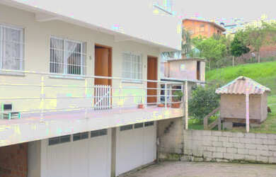 Imagem: A casa possui 2 Dormitórios, 1 Banheiro, 1 Vaga na garagem