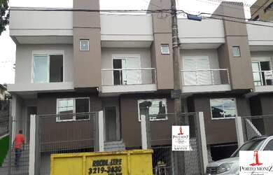 Imagem: A casa possui 3 Dormitórios, 1 Suíte, 3 Banheiros, 2 Vagas