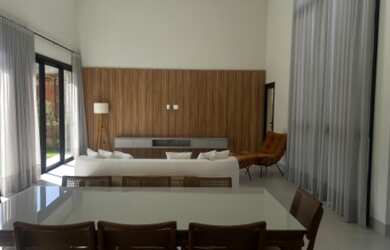 Imagem: A casa em condomínio possui 4 Dormitórios, 4 Suítes, 3 Vagas