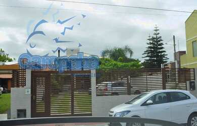 Imagem: A casa possui 5 Dormitórios, 1 Suíte, 3 Banheiros, 4 Vagas