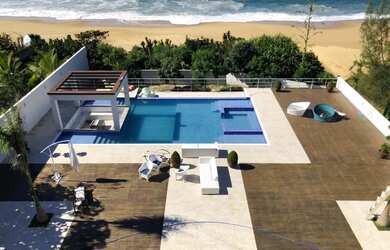 Imagem: A casa possui 6 Dormitórios, 6 Suítes, 8 Banheiros, 3 Vagas