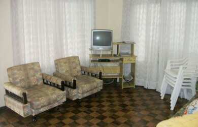 Imagem: A casa possui 3 Dormitórios, 2 Banheiros, 3 Vagas na garagem