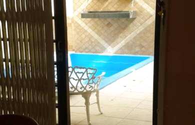 Imagem: A casa possui 6 Dormitórios, 4 Suítes, 6 Banheiros, 4 Vagas