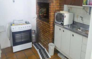 Imagem: A casa possui 4 Dormitórios, 3 Suítes, 4 Banheiros, 4 Vagas