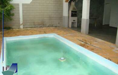 Imagem: A casa possui 3 Dormitórios, 1 Suíte, 4 Banheiros, 4 Vagas