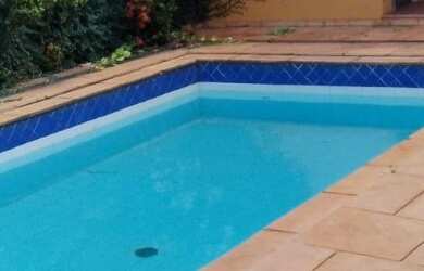 Imagem: A casa possui 5 Dormitórios, 5 Suítes, 7 Banheiros, 4 Vagas