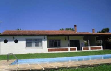 Imagem: A chácara possui 5 Dormitórios, 3 Suítes, 3 Banheiros, 4