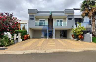 Imagem: A casa em condomínio possui 4 Dormitórios, 4 Suítes, 5 Banheiros