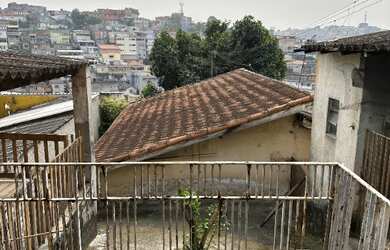 Imagem: A casa possui 2 Dormitórios, 3 Banheiros, 4 Vagas na garagem