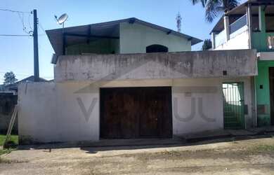 Imagem: A casa possui 3 Dormitórios, 2 Banheiros, 250m² de Área e