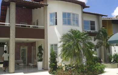 Imagem: A casa possui 4 Dormitórios, 3 Suítes, 6 Banheiros, 6 Vagas