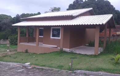 Imagem: A casa possui 2 Dormitórios, 1 Suíte, 2 Banheiros, 2 Vagas