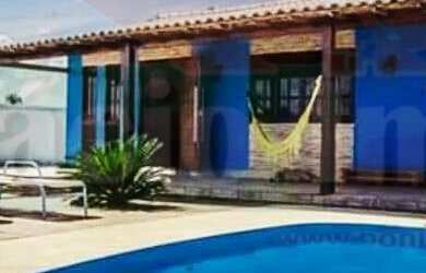 Imagem: A casa possui 3 Dormitórios, 1 Suíte, 2 Banheiros, 5 Vagas