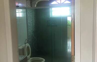 Imagem: A casa possui 3 Dormitórios, 2 Banheiros, 3 Vagas na garagem