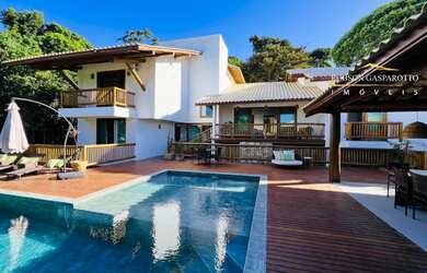 Imagem: A casa em condomínio possui 5 Dormitórios, 5 Suítes, 8 Banheiros