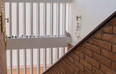 Imagem: A casa possui 3 Dormitórios, 3 Suítes, 5 Banheiros, 3 Vagas