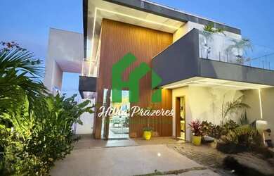 Imagem: A casa em condomínio possui 4 Dormitórios, 4 Suítes, 6 Banheiros