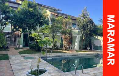 Imagem: A casa possui 4 Dormitórios, 4 Suítes, 7 Banheiros, 4 Vagas