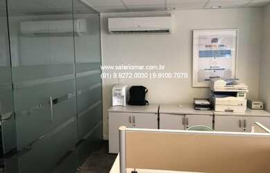 Imagem: A sala comercial possui 2 Vagas na garagem, 60m² de Área Privada