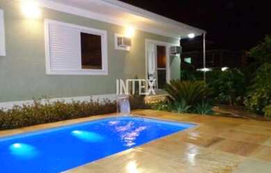 Imagem: A casa possui 4 Dormitórios, 3 Suítes, 4 Banheiros, 4 Vagas