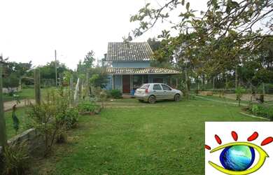 Imagem: A casa possui 2 Dormitórios, 1 Banheiro, 1 Vaga na garagem