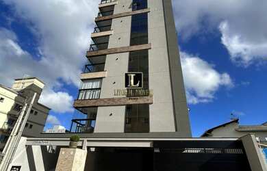 Imagem: O apartamento possui 2 Dormitórios, 1 Suíte, 2 Vagas na garagem