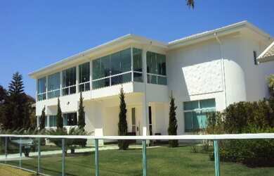 Imagem: A casa possui 10 Dormitórios, 10 Suítes, 14 Banheiros, 9 Vagas