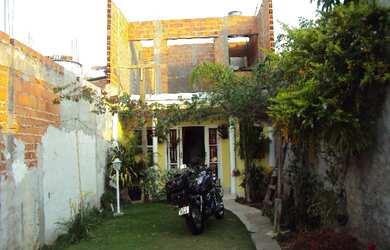 Imagem: A casa possui 1 Dormitório, 1 Banheiro, 6 Vagas na garagem