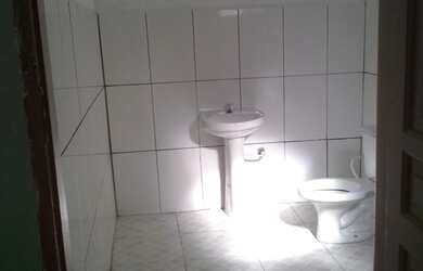 Imagem: A casa possui 2 Dormitórios, 1 Suíte, 2 Banheiros, 1 Vaga