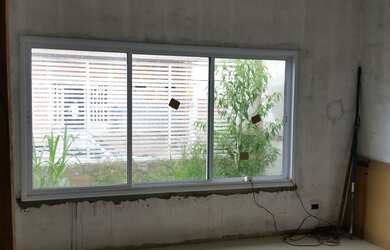 Imagem: A casa possui 3 Dormitórios, 1 Suíte, 3 Banheiros, 2 Vagas