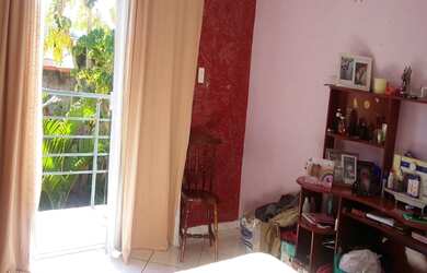 Imagem: A casa possui 2 Dormitórios, 1 Banheiro, 2 Vagas na garagem