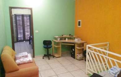 Imagem: A casa possui 2 Dormitórios, 1 Suíte, 3 Banheiros, 2 Vagas