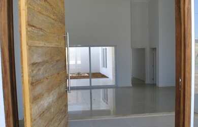 Imagem: A casa possui 4 Dormitórios, 4 Suítes, 4 Banheiros, 3 Vagas