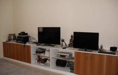 Imagem: A casa possui 4 Dormitórios, 3 Suítes, 6 Banheiros, 4 Vagas