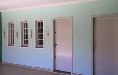 Imagem: A casa possui 2 Dormitórios, 3 Banheiros, 2 Vagas na garagem