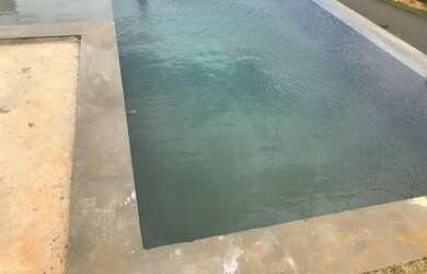 Imagem: A casa possui 4 Dormitórios, 4 Suítes, 2 Banheiros, 4 Vagas